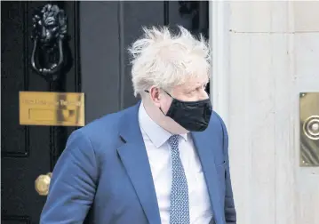  ?? AFP ?? Prime Minister Boris Johnson leaves 10 Downing Street to take part in a weekly session at the House of Commons.