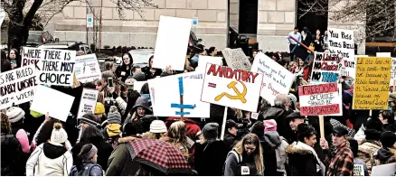  ?? RACHEL LA CORTE/ASSOCIATED PRESS ?? Opponents protest bills Feb. 20 in Olympia, Wash., that would bar parents from using philosophi­cal exemptions to avoid immunizing their children.