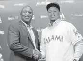  ?? ALAN DIAZ/AP ?? Miami Marlins president of baseball operations Michael Hill introduced pitcher Edinson Volquez Thursday and made it clear fans should expect more moves.