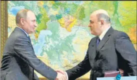  ?? REUTERS ?? President Vladimir Putin (left) with Mikhail Mishustin.