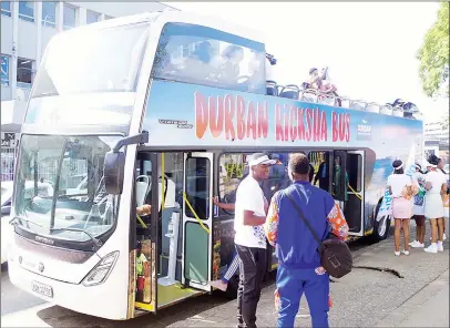  ?? (Pics: Sibusiso Zwane) ?? Minister of Tourism and Environmen­tal Affairs Moses Vilakati pictured at the top the Durban’s Ricksha Bus.