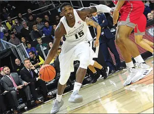  ?? Photo by Ernest A. Brown ?? The Big East on Monday tabbed PC forward Emmitt Holt, pictured against Sacred Heart in a Nov. 2019 game, as one of three players to receive the league’s Sportsmans­hip Award.