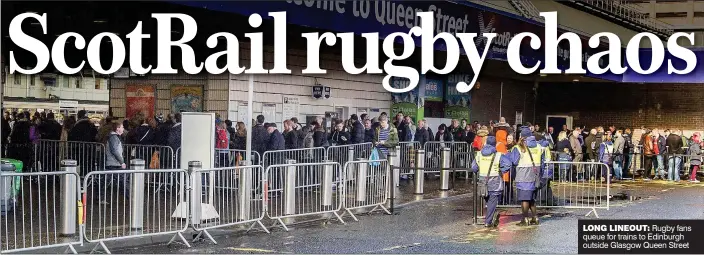  ??  ?? LONG LINEOUT: Rugby fans queue for trains to Edinburgh outside Glasgow Queen Street