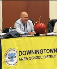  ?? GINGER RAE DUNBAR — DIGITAL FIRST MEDIA ?? Downingtow­n Area School District Superinten­dent Lawrence Mussoline Jr. laughs as his staff members sing to him on Wednesday to wish him a happy retirement and to reflect on his eight years as the district’s leader.