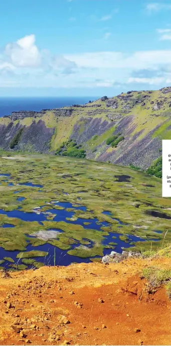  ??  ?? Crater of life
The dormant Rano Kau is thought to have last erupted around 180,000 years ago – its crater lake is one of the island’s only three natural bodies of fresh water; (previous spread) fifteen moai stand up on the Ahu Tongariki platform on Easter Island’s south-east corner