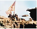  ??  ?? Marines landing in Guam during the 1944 invasion. Note their landing craft are the amphibious tractors (Amtracks) developed especially for island fighting (US National archives)