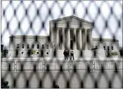  ?? JOSE LUIS MAGANA / AP, FILE ?? The U.S. Supreme Court is seen behind a fence who stands around the building on Thursday, May 5, in Washington.