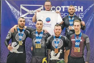  ??  ?? The Oban BJJ team that competed at Ravenscrai­g. Back row, left to right, Coogie Potter, Tomasz Kapusta; front row, left to right, Dawid Loukil, Mateusz Grabiec, Ruarigh Black, Liam Roberts.