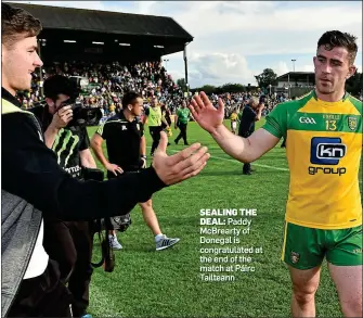  ??  ?? SEALING THE
DEAL: Paddy McBrearty of Donegal is congratula­ted at the end of the match at Páirc Tailteann