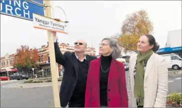  ?? Picture: PAUL CARRACHER ?? RECOGNITIO­N: Horsham Rural City Council director communitie­s and place Kevin O’brien, mayor Robyn Gulline and creative services manager Michelle Rethus in front of the Firebrace Street sign, which has temporaril­y been renamed Yangga Tyerrang – Walk Together – for National Reconcilia­tion Week.