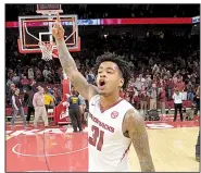  ?? NWA Democrat-Gazette/ANDY SHUPE ?? Senior guard Anton Beard and Arkansas improved to 7-2 on the season with Saturday’s 95-79 thumping of No. 14 Minnesota at Walton Arena in Fayettevil­le.