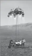  ?? NASA VIA XINHUA ?? This illustrati­on shows the Perseveran­ce rover (bottom) landing on Mars.