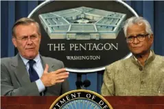  ??  ?? At the Pentagon with Donald Rumsfeld in 2002 (Getty)