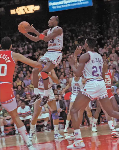  ?? JOHN SWART/AP ?? Michael Jordan grabs a rebound during the 1988 NBA All-Star Game at Chicago Stadium. His East team won 138-133, and he was unanimousl­y named the most valuable player.