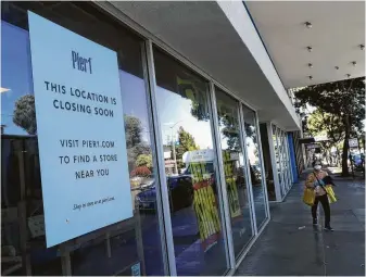  ?? Justin Sullivan / Tribune News Service ?? A sign is posted on the front of a closed Pier 1 store in San Francisco. The company has announced plans to close all of its 540 stores after 58 years in business.