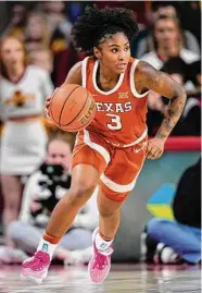  ?? Charlie Neibergall/Associated Press ?? Sophomore point guard Rori Harmon has helped Texas win 18 of its past 21 games.