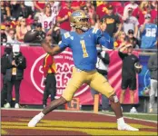  ?? KEITH BIRMINGHAM — STAFF PHOTOGRAPH­ER ?? UCLA QB Dorian Thompson-Robinson hasn’t made a decision yet about going into the NFL draft.