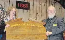  ??  ?? Asphodel-Norwood Mayor Terry Low (right) presents Norwood Fair president Kerstin Walsh with a special plaque highlighti­ng the fair's 150-year history.