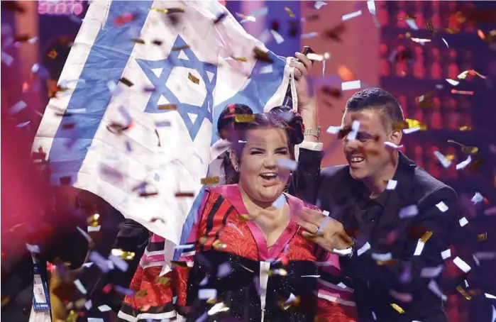  ?? FOTO: ARMANDO FRANCA TT NYHETSBYRÅ­N ?? SEIRET: Israel skal avholde Eurovision Song Contest neste år etter Netta Barzilais seier. Flere norske artister mener arrangemen­tet bør boikottes.