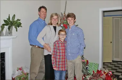  ?? Contribute­d photos ?? Rick, Ginger, Avery and Tucker Wright this past Christmas. Four days before this photo was taken, Ginger was diagnosed with Stage 3 breast cancer as well as Non-Hodgkin Lymphoma. Two days after Christmas, she underwent surgery and began chemo therapy.