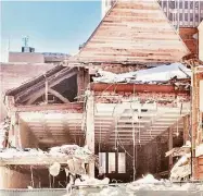  ?? Courtesy of the New Haven Preservati­on Trust ?? An image of the original St. Thomas Episcopal Church in New Haven being torn down.