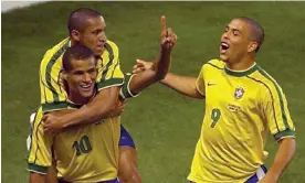  ?? Photograph: Pascal Guyot/AFP/Getty Images ?? Rivaldo (10) is congratula­ted by Roberto Carlos (on top) and Ronaldo after scoring against Denmark in the 1998 World Cup.