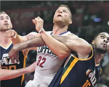  ?? Wally Skalij Los Angeles Times ?? FREE AGENT FORWARDS Blake Griffin, center, and Gordon Hayward, left, squared off in a firstround playoff series two months ago but could be wearing different uniforms next season.