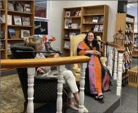  ?? (Arkansas Democrat-Gazette/Philip Martin) ?? Democrat-Gazette Perspectiv­e Editor Karen Martin interviews Monica Potts at WordsWorth Books in Little Rock.