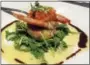  ?? STEPHEN FRIES — SPECIAL TO THE REGISTER ?? Sea Guini’s gamberetti (prosciutto di parmawrapp­ed jumbo shrimp, arugula, bruschetta tomatoes, tangy balsamic, lemon burro sauce).