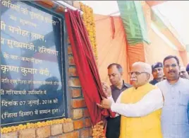  ?? HT PHOTO ?? Chief minister Manohar Lal Khattar inaugurati­ng the rehabilita­tion scheme for Mirchpur victims in Hisar on Saturday.