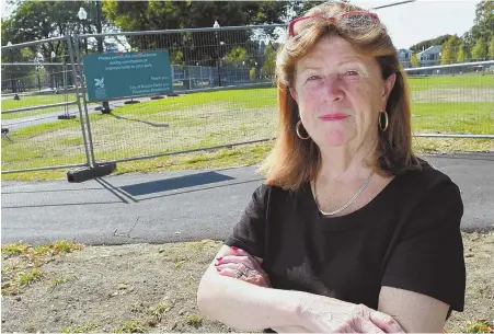  ?? STAFF PHOTOS BY CHRISTOPHE­R EVANS ?? ‘I ALMOST FAINTED’: Joanne McDevitt says she was shocked the city spent $5 million to build Medal of Honor Park, above.