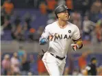  ?? Patrick Farrell / Miami Herald / TNS ?? Giancarlo Stanton sets a Marlins record with his 43rd homer of the season.