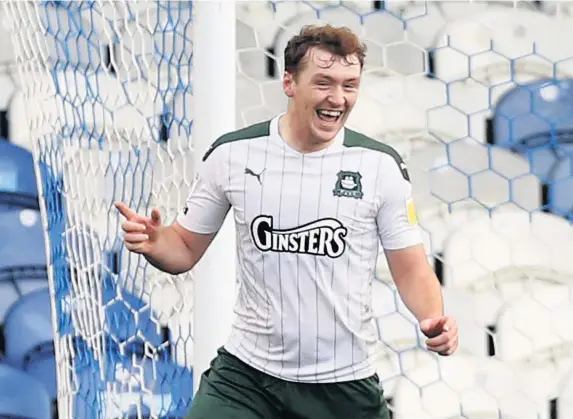  ?? Dave Rowntree/PPAUK ?? > Luke Jephcott celebrates after another double for Argyle at Portsmouth took League One’s top goalscorer to 16 goals for the campaign