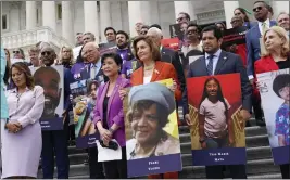  ?? J. SCOTT APPLEWHITE — THE ASSOCIATED PRESS ?? From left, Rep. Veronica Escobar, D-Texas, Rep. Judy Chu, D-Calif., House Speaker Nancy Pelosi, D-Calif., Rep. Jimmy Gomez, D-Calif., and Rep. Carolyn Maloney, D-N.Y., on the steps of the U.S. Capitol on Friday for an event about gun violence.