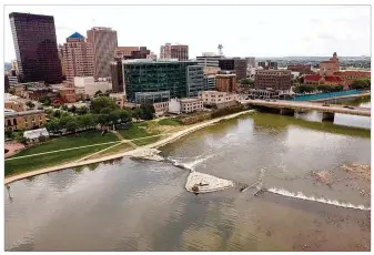  ??  ?? High water levels caused by stormy weather have resulted in less paddling activity at the River Run than would be anticipate­d for downtown’s newest and splashiest river attraction.