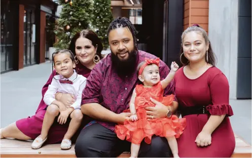  ??  ?? ABOVE / ‘I call them my three healing songs. They teach me to be a better man.’ Matt and Sarah Brown adore their three children (left to right): son Angelou, youngest daughter Frida and eldest daughter Oceana. OPPOSITE / The team behind My Father’s Barber and She is Not Your Rehab, the anti-violence movement founded and championed by Matt and his wife, Sarah. Photos supplied.