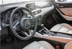  ??  ?? 2017 Mazda6 models come equipped with a SkyActiv-G 2.5-liter engine and feature added sound insulation improvemen­ts throughout their interiors and door sealing.