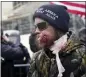  ?? JULIO CORTEZ — THE ASSOCIATED
PRESS FILE ?? Joshua Matthew Black, a supporter of then-President Donald Trump, is shown injured during clashes with police at the U.S. Capitol in Washington on Jan. 6, 2021.