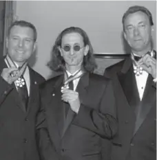  ?? JIM YOUNG/THE CANADIAN PRESS FILE PHOTO ?? Rush, from left, Alex Lifeson, Geddy Lee, and Neil Peart, has been nominated to the Rock and Roll Hall of Fame for the first time.