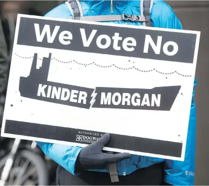  ?? JONATHAN HAYWARD/THE CANADIAN PRESS ?? Members of the OneCity Vancouver party want the Kinder Morgan pipeline stopped.