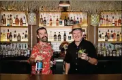  ?? CONTRIBUTE­D BY MIA YAKEL ?? The Tiki Tango team includes bar manager Gary “Boatz” Campus (left) and designer “Tiki Ranger” Frank Simotics.