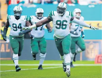  ?? BRYN LENNON/GETTY IMAGES ?? The New York Jets will be the Dolphins’ opponent Sept. 16 in New Jersey and Nov. 4 at Hard Rock Stadium.