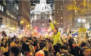  ?? Picture / AP ?? Anti-Trump protesters took to the streets of Philadelph­ia as Republican Congressme­n met in the city yesterday.