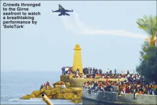  ?? ?? Crowds thronged to the Girne seafront to watch a breathtaki­ng performanc­e by 'SoloTürk'