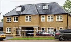  ??  ?? Crime scene: The couple’s mansion in the Surrey stockbroke­r belt