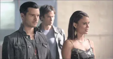  ??  ?? RESIDENT EVIL: Lorenzo ‘Enzo’ St John (Michael Malarkey), Damon Salvatore (Ian Somerhalde­r) and Nathalie Kelley as Sybil (aka The Siren) in the supernatur­al drama, The Vampire Diaries. Right: Somerhalde­r with Nina Dobrev, who plays Elena.