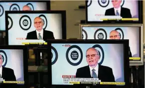  ?? — Reuters ?? Murdoch’s pledge: Murdoch is seen talking on Sky News on television screens in an electrical store in Edinburgh. He has agreed to sell Fox’s entertainm­ent assets including its stake in Sky to Walt Disney Co.
