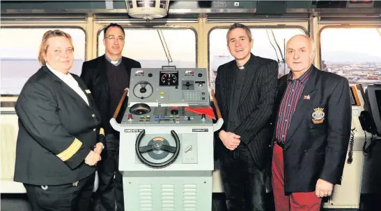  ??  ?? PILGRIMAGE ON THE SEA: Members of Holy Trinity Church organised a pilgrimage in 2014 to visit the graves of eight First World
War soldiers from the region who were buried World War One cemetery at Tyne Cot in Belgium. Pictured on board the Pride of Bruges were (from left) onboard service manager Alie Visser, Canon Reverend Dr Neal Barnes, Pioneer Minister Reverend Matt Woodcock and Keith Thompson in the Captain’s area on board the Pride of Bruges on their way to Belgium, when they presented the Captain with a plaque and laid a wreath in the sea near Spurn Point.