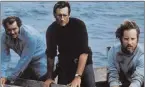  ?? Universal Pictures ?? Robert Shaw, Roy Scheider and Richard Dreyfuss are pictured in a scene from “Jaws.”