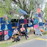  ?? ?? Vendedores de trajes de baño dijeron que las ventas no fueron buenas